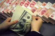 Chinese banks' forex settlement deficit expands in December 