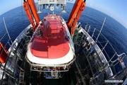 China's submersible Jiaolong to carry Xinhua journalist into Mariana Trench 