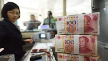 China mulls new yuan pricing formula to raise stability