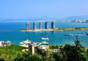 Hainan signs MOU with British travel operator to promote Sanya tourism internationalization