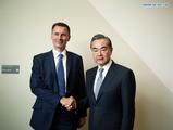 China, Britain agree to defend int'l system, multilateralism