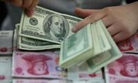 China's forex reserves edge down in October