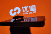 China's online used car dealer Uxin extends losses on Q1 earnings report 