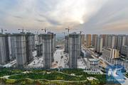 China property developers to see leverage improve: Moody's