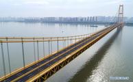 World's longest double-deck suspension bridge opens to traffic