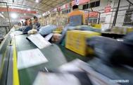 China's postal industry expands 21.6 pct in first 11 months
