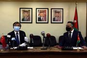 Chinese, Jordanian FMs hold phone conversation