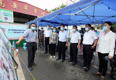 淮北市市长覃卫国一行深入杜集区调研文明创建工作