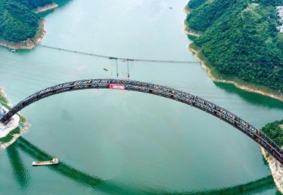 在建世界最大跨径拱桥——天峨龙滩特大桥主桥拱桁实现合龙