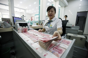 1st LD: China's new yuan loans rise in first two months