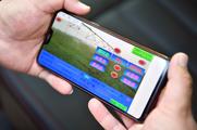 China's mobile phone shipments back to growth in April