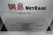 NetEase shares rise on Hong Kong market debut