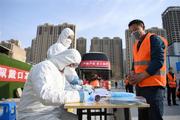 China ups poverty relief efforts as more migrant workers return to work 