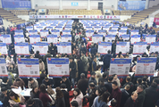 China's surveyed unemployment rate drops in June
