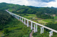 Feature: Chinese firms lay tracks through 1st major station of China-Laos railway