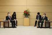 Japanese PM Suga meets Chinese FM, agrees to enhance bilateral relations