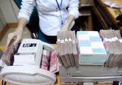 Chinese commercial banks' non-performing loan ratio down to 1.8 pct