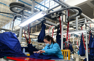Economic Watch: China's manufacturing PMI edges down as holiday slackens activity