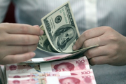 China's forex reserves fall in March