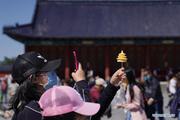 China sees 230 mln domestic tourist trips during May Day holiday
