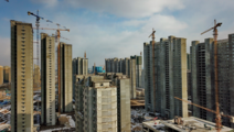 China's home prices slightly up in May 