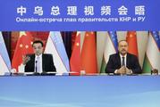 China vows to boost ties with Uzbekistan 
