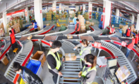 China handles over 6.59 bln packages during mid-year shopping spree 