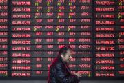 China's stock market ends mixed in June