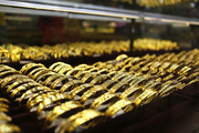 China's benchmark interbank gold prices higher Friday