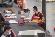 China's express industry to see faster consolidation: Fitch