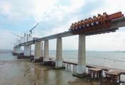 Track-laying begins on China's first sea-crossing high-speed railway