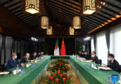 Chinese FM holds talks with Algerian, Tanzanian counterparts