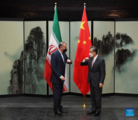 Chinese FM meets Iranian counterpart