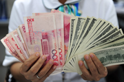 Chinese yuan strengthens to 6.6566 against USD Tuesday
