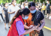Foreign volunteers join fight against COVID-19 in Hainan