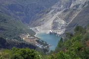 World's first barrier dam comprehensive water conservancy project starts operation in SW. China's Yunnan