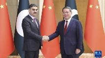李强会见巴基斯坦总理卡卡尔