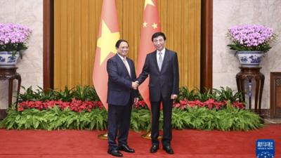 王沪宁会见越南总理范明政