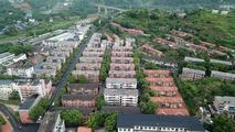 China's home prices see narrowed drops as policy supports unfold