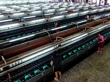 China strives to build more competitive mulberry silk industry 